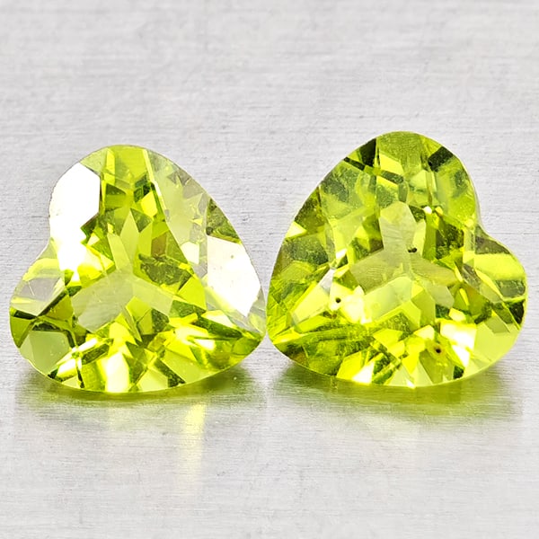 Natural Green Peridot Gemstones 1.10 Ct. 2 Pcs. Heart Shape 6.1 x 6.1 Mm.: Product ID: 805317318 Product Name: Natural Peridot Weight: 1.10 CT. Size: 6.1 x 6.1 x 3.6 MM. Shape: Heart Shape Color: Green Clarity:VSI - SI1 Luster: Good Gems Origin: Pakistan Treatment: Unheated 