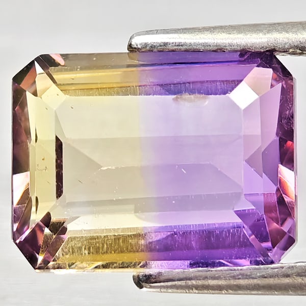 Natural Bi Color Ametrine Gemstones 2.74 Ct. Octagon Shape 9.8 x 7.6 Mm.: Product ID: 800408375 Product Name: Natural Ametrine Weight: 2.74 CT. Size: 9.8 x 7.6 x 4.8 MM. Shape: Octagon Color: Bi Color Clarity:VSI Luster: Good Gems Origin: Bolivia Treatment: Unheated Crystal