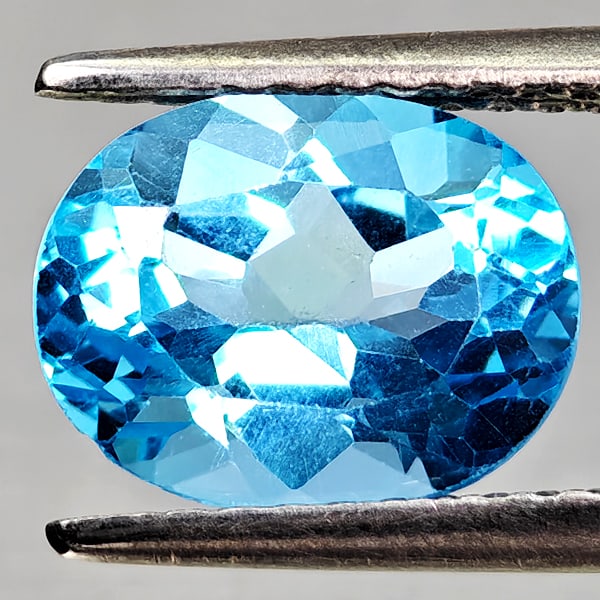 Natural Swiss Blue Topaz Gemstones 2.54 Ct. Oval Shape 9.2 x 7.2 Mm.: Product ID: 807168170 Product Name: Natural Blue Topaz Weight: 2.54 CT. Size: 9.2 x 7.2 x 5.1 MM. Shape: Oval Shape Color: Swiss Blue Clarity:VVS - VSI Luster: Good Gems Origin: Brazil Treatment: Trea