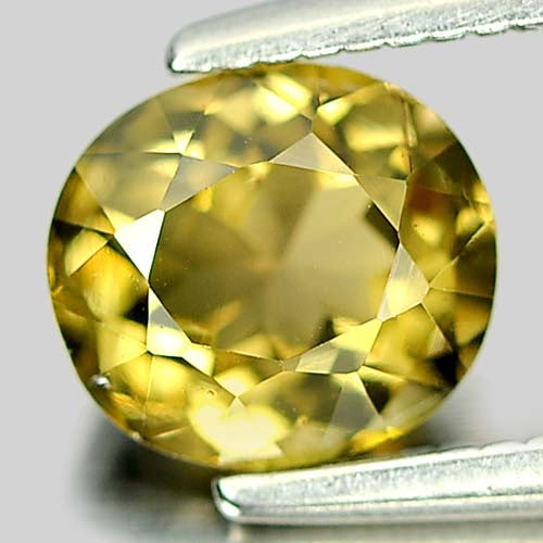 Natural Greenish Yellow Tourmaline Gemstones 0.95 Ct. Oval Shape 6.4 x 5.7 Mm.: Product ID: 807246025 Product Name: Natural Tourmaline Weight: 0.95 CT. Size: 6.4 x 5.7 x 3.9 MM. Shape: Oval Color: Greenish Yellow Clarity:VSI Luster: Good Gems Origin: Nigeria Treatment: Unheated C