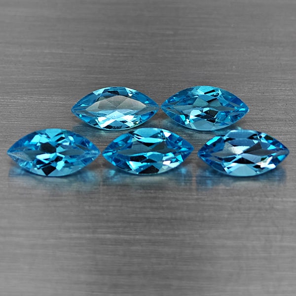 Natural Swiss Blue Topaz Gemstones 6.07 Ct. 5 Pcs. Marquise Shape 10 x 5.1 Mm.: Product ID: 807168703 Product Name: Natural Blue Topaz Weight: 6.07 CT. Size: 10 x 5.1 x 4 MM. Shape: Marquise Shape Color: Swiss Blue Clarity:VSI Luster: Very Good Gems Origin: Brazil Treatment: Trea
