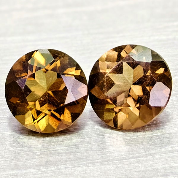 Natural Smokey Color Quartz Gemstones 1.80 Ct. 2 Pcs. Round Shape 6.4 Mm.: Product ID: 805529904 Product Name: Natural Quartz Weight: 1.80 CT. Size: 6.4 x 6.4 x 4.1 MM. Shape: Round Color: Smokey Clarity:VSI Luster: Good Gems Origin: Brazil Treatment: Unheated Crystal Struct