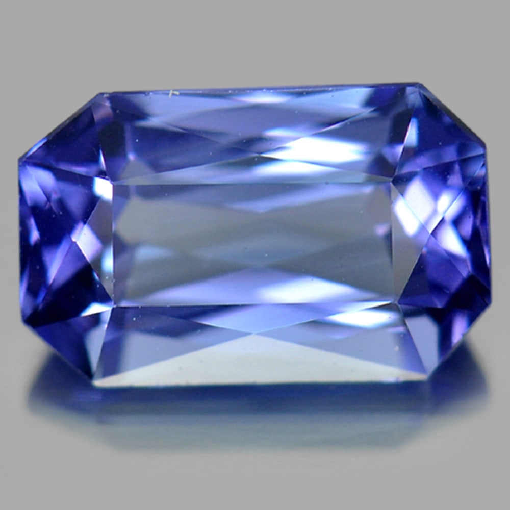 Natural Blue Tanzanite Gemstones 1.43 Ct. Clean Octagon Shape 8.1 x 5.2 Mm.: Product ID: 807006219 Product Name: Natural Tanzanite Weight: 1.43 CT. Size: 8.1 x 5.2 x 3.9 MM. Shape: Octagon Color: Violetish Blue Clarity:IF Luster: Very Good Gems Origin: Tanzania Treatment: Heat