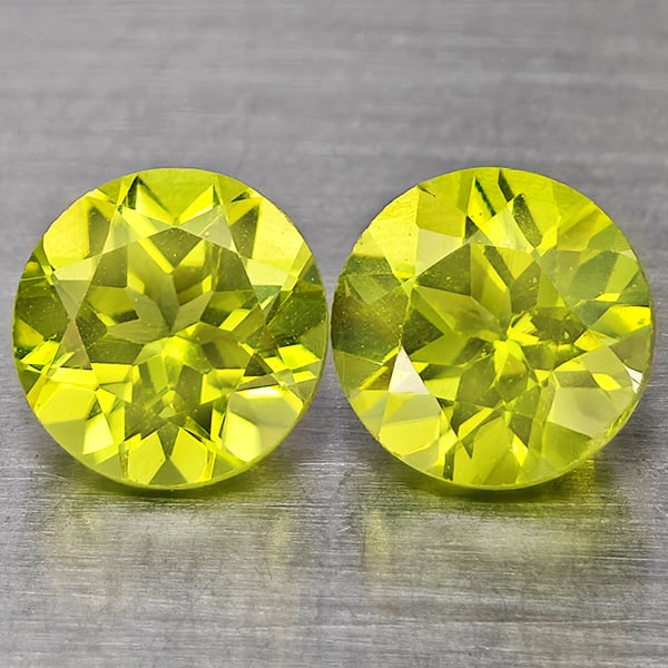 Natural Green Peridot Gemstones 1.32 Ct. 2 Pcs. Round Shape 5.3 Mm.: Product ID: 805317664 Product Name: Natural Peridot Weight: 1.32 CT. Size: 5.3 x 5.3 x 3.7 MM. Shape: Round Color: Green Clarity:VSI Luster: Good Gems Origin: Pakistan Treatment: Unheated Crystal Stru