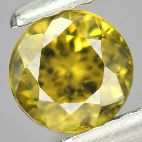 Natural Greenish Yellow Demantoid Garnet Gemstones 1.01 Ct. Round Shape 5.6 Mm.: Product ID: 802922475 Product Name: Natural Demantoid Weight: 1.01 CT. Size: 5.6 x 5.6 x 4.1 MM. Shape: Round Color: Greenish Yellow Clarity:VSI Luster: Very Good Gems Origin: Madagascar Treatment: Un