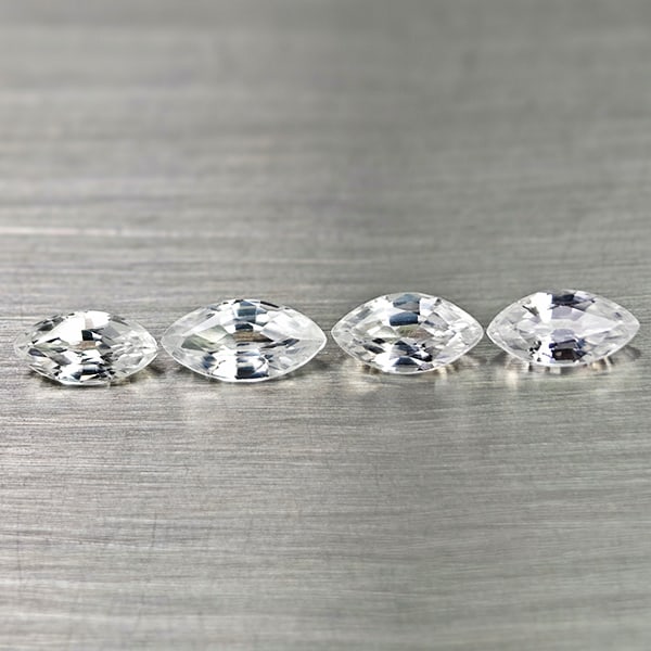 Natural White Color Zircon Gemstones 2.76 Ct. 4 Pcs. Marquise Shape: Product ID: 807742978 Product Name: Natural Zircon Weight: 2.76 CT. Size: 8 x 4.1 x 2.5 MM. Shape: Marquise Color: White Clarity:VSI Luster: Good Gems Origin: Cambodia Treatment: Heated Crystal Struct