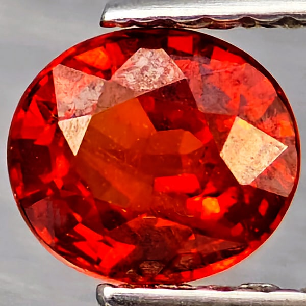 Natural Orangish Red Spessartine Garnet Gemstones 1.03 Ct. Oval Shape 6.2 x 5.4 Mm.: Product ID: 802937054 Product Name: Natural Garnet Weight: 1.03 CT. Size: 6.2 x 5.4 x 3.5 MM. Shape: Oval Shape Color: Orangish Red Clarity:VSI Luster: Good Gems Origin: Namibia Treatment: Unheated Cr