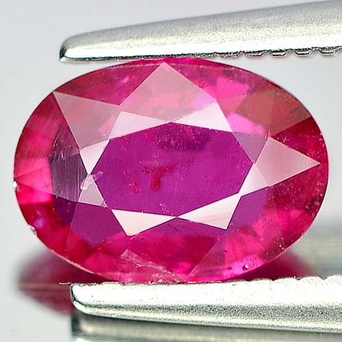 Natural Purplish Pink Ruby Gemstones 1.15 Ct. Oval Shape 7.6 x 5.5 Mm.: Product ID: 805920128 Product Name: Natural Ruby Weight: 1.15 CT. Size: 7.6 x 5.5 x 2.9 MM. Shape: Oval Color: Purplish Pink Clarity:VSI Luster: Good Gems Origin: Mozambique Treatment: Heated (Lead-gl