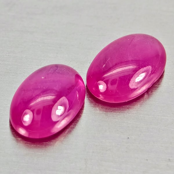 Natural Pink Red Jonson Ruby Gemstones 1.22 Ct. 2 Pcs. Oval Cabochon Shape 6 x 4.1 Mm.: Product ID: 805935764 Product Name: Natural Ruby Weight: 1.22 CT. Size: 6 x 4.1 x 2.4 MM. Shape: Oval Cabochon Color: Pink Red Clarity:Semi - Transparent Luster: Good Gems Origin: Mozambique Treatment