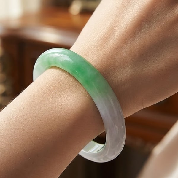 Natural Multi-Color Jade Gemstones Bangle 261.14 Ct. Diameter 54 Mm.: Product ID: 819815158 Product Name: Natural Jade Weight: 261.14 CT. Size: 73 x 54 x 10 MM. Shape: Round Cabochon Color: Multi-Color Clarity:Opaque Luster: Good Gems Origin: Thailand Treatment: Unheate