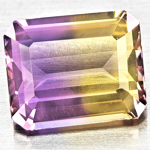 Natural Bi Color Ametrine Gemstones 3.10 Ct. Octagon Shape 10.1 x 8.1 Mm.: Product ID: 800408461 Product Name: Natural Ametrine Weight: 3.10 CT. Size: 10.1 x 8.1 x 5 MM. Shape: Octagon Color: Bi Color Clarity:VSI Luster: Good Gems Origin: Bolivia Treatment: Unheated Crystal 