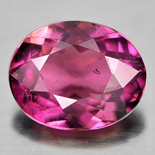 Natural Purplish Pink Tourmaline Gemstones 0.66 Ct. Oval Shape 6.5 x 5.2 Mm.: Product ID: 807246859 Product Name: Natural Tourmaline Weight: 0.66 CT. Size: 6.5 x 5.2 x 2.9 MM. Shape: Oval Color: Purplish Pink Clarity:VSI Luster: Good Gems Origin: Nigeria Treatment: Unheated Cry