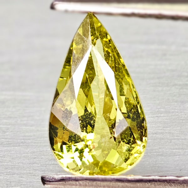 Natural Yellow Chrysoberyl Gemstones 1.26 Ct. Pear Shape 8.8 x 5.2 Mm.: Product ID: 801703100 Product Name: Natural Chrysoberyl Weight: 1.26 CT. Size: 8.8 x 5.2 x 4 MM. Shape: Pear Shape Color: Yellow Clarity:VSI Luster: Very Good Gems Origin: Madagascar Treatment: Unheat