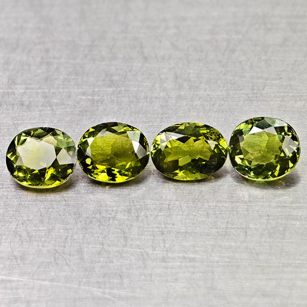 Natural Green Tourmaline Gemstones 3.03 Ct. 4 Pcs. Oval Shape 6.8 x 4.9 Mm.: Product ID: 807250622 Product Name: Natural Tourmaline Weight: 3.03 CT. Size: 6.8 x 4.9 x 3.3 MM. Shape: Oval Color: Green Clarity:VSI Luster: Good Gems Origin: Nigeria Treatment: Unheated Crystal Str