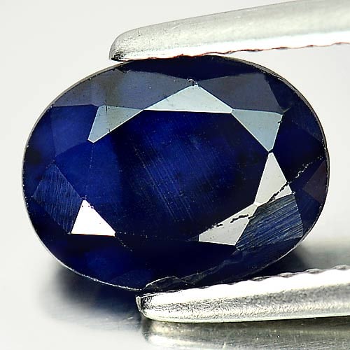 Natural Deep Blue Sapphire Gemstone 2.34 Ct. Oval Shape 9 x 7 Mm.: Product ID: 806011294 Product Name: Natural Blue Sapphire Weight: 2.34 CT. Size: 9 x 7 x 4.2 MM. Shape: Oval Color: Deep Blue Clarity:Opaque Luster: Good Gems Origin: Madagascar Treatment: Heated (Lea