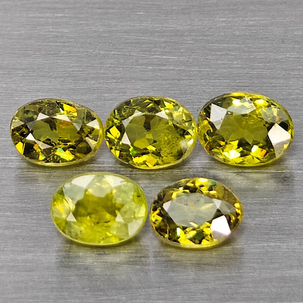 Natural Green Demantiod Garnet Gemstones 1.23 Ct. 5 Pcs. Oval Shape 4.2 x 3 Mm.: Product ID: 802937465 Product Name: Natural Demantoid Weight: 1.23 CT. Size: 4.2 x 3 x 2.1 MM. Shape: Oval Shape Color: Green Clarity:SI1 Luster: Good Gems Origin: Madagascar Treatment: Unheated Cryst