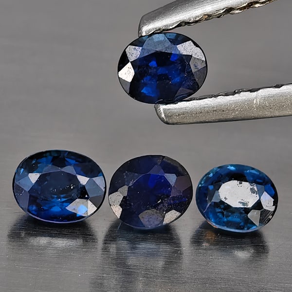 Natural Blue Sapphire Gemstones 0.49 Ct. 4 Pcs. Oval Shape And Mixed Size: Product ID: 806012375 Product Name: Natural Blue Sapphire Weight: 0.49 CT. Size: 3.3 x 2.8 x 1.9 to 3 x 2.5 x 2 MM. Shape: Oval Color: Blue Clarity:VSI Luster: Good Gems Origin: Madagascar Treatment: 