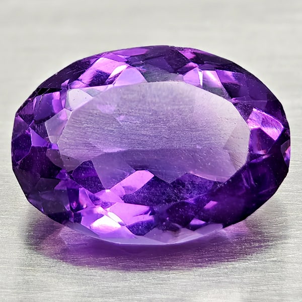 Natural Purple Amethyst Gemstones 4.89 Ct. Oval Shape 12.7 x 9.3 Mm.: Product ID: 800325405 Product Name: Natural Amethyst Weight: 4.89 CT. Size: 12.7 x 9.3 x 6.5 MM. Shape: Oval Color: Purple Clarity:VVS - VSI Luster: Good Gems Origin: Brazil Treatment: Unheated Crysta