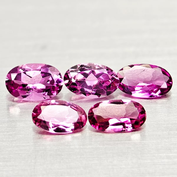 Natural Pink Tourmaline Gemstones 1.13 Ct. 5 Pcs. Oval Shape and Mixed Size: Product ID: 807250983 Product Name: Natural Tourmaline Weight: 1.13 CT. Size: 5.2 x 3.4 x 2.5 to 5 x 3.1 x 2.6 MM. Shape: Oval Color: Pink Clarity:VSI Luster: Good Gems Origin: Nigeria Treatment: Unhe