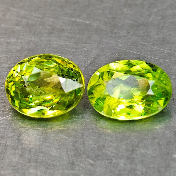 Natural Sphene Gemstones Intense Yellow Green Titanium Red Spark 1.17 Ct. 2 Pcs. Oval Shape and: Product ID: 806509035 Product Name: Natural Sphene Weight: 1.17 CT. Size: 6 x 4.4 x 2.6 to 5.7 x 4.5 x 3 MM. Shape: Oval Shape Color: Intense Yellow Green With Red Spark Clarity:SI1 Luster: Good Gems 