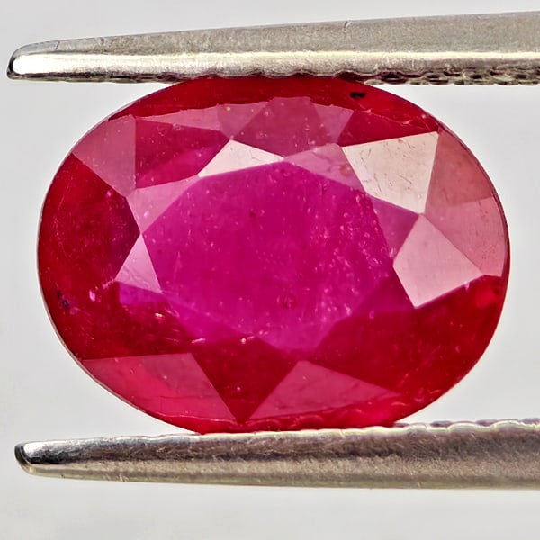 Natural Purplish Red Ruby Gemstones 2.20 Ct. Oval Shape 9.1 x 7.2 Mm: Product ID: 805935594 Product Name: Natural Ruby Weight: 2.20 CT. Size: 9.1 x 7.2 x 3.8 MM. Shape: Oval Color: Purplish Red Clarity:VSI Luster: Good Gems Origin: Madagascar Treatment: Heated (Lead-gla
