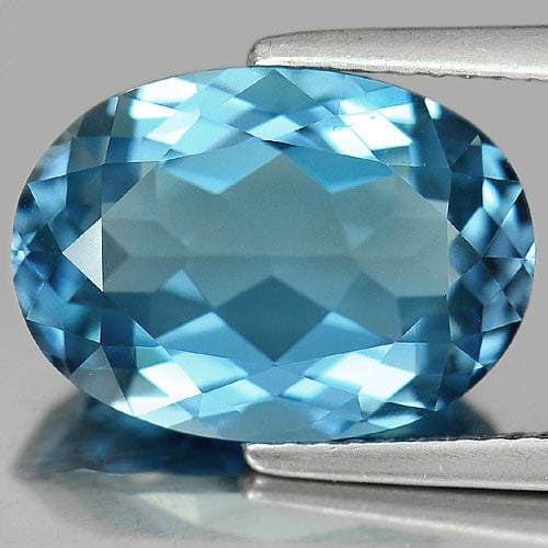 Natural London Blue Gemstones 7.36 Ct. Clean Oval Shape 14.2 x 10 Mm.: Product ID: 807165543 Product Name: Natural Blue Topaz Weight: 7.36 CT. Size: 14.2 x 10 x 6.3 MM. Shape: Oval Color: Blue Clarity:IF Luster: Very Good Gems Origin: Brazil Treatment: Treated Crystal St