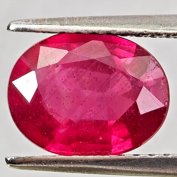 Natural Purplish Red Ruby Gemstone 2.37 Ct. Oval Shape 9.2 x 7.3 Mm.: Product ID: 805935631 Product Name: Natural Ruby Weight: 2.37 CT. Size: 9.2 x 7.3 x 4 MM. Shape: Oval Color: Purplish Red Clarity:VSI Luster: Good Gems Origin: Madagascar Treatment: Heated (Lead-glass