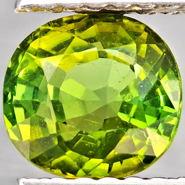 Natural Green Tourmaline Gemstones 1.19 Ct. Oval Shape 6.3 x 5.8 Mm.: Product ID: 807251112 Product Name: Natural Tourmaline Weight: 1.19 CT. Size: 6.3 x 5.8 x 4.1 MM. Shape: Oval Shape Color: Green Clarity:SVI Luster: Very Good Gems Origin: Nigeria Treatment: Unheated 