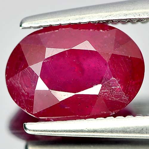 Natural Pinkish Red Ruby Gemstones 1.98 Ct. Oval Shape 8.6 x 6 Mm.: Product ID: 805918788 Product Name: Natural Ruby Weight: 1.98 CT. Size: 8.6 x 6 x 4 MM. Shape: Oval Color: Red Clarity:VSI Luster: Good Gems Origin: Madagascar Treatment: Heated Lead-glass filling Cry