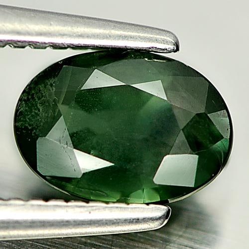Natural Green Sapphire Gemstones 0.72 Ct. Oval Shape 6.5 x 4.7 Mm.: Product ID: 806157850 Product Name: Natural Green Sapphire Weight: 0.72 CT. Size: 6.5 x 4.7 x 2.8 MM. Shape: Oval Color: Green Clarity:VSI Luster: Good Gems Origin: Thailand Treatment: Heated Crystal 