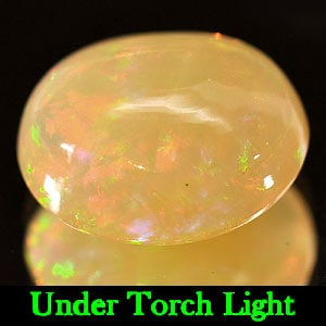 Natural Multi-Color Play Of Colour Opal Gemstones 3.30 Ct. Oval Cabochon Shape 11.7 x 10.3 Mm.: Product ID: 818722551 Product Name: Natural Opal Weight: 3.30 CT. Size: 11.7 x 10.3 x 6 MM. Shape: Oval Cabochon Color: Multi Color Clarity:Semi - Transparent Luster: Iridescent Gems Origin: Ethiopia 