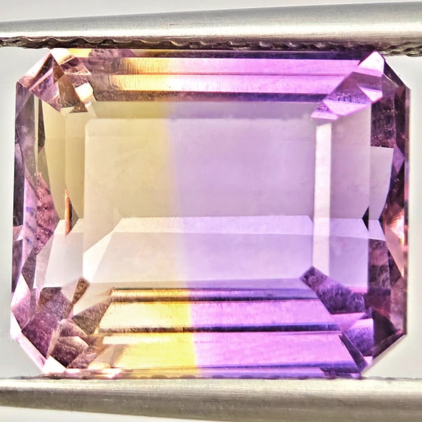 Natural Bi Color Ametrine Gemstones 3.31 Ct. Octagon Shape 11.8 x 9.8 Mm.: Product ID: 800408552 Product Name: Natural Ametrine Weight: 3.31 CT. Size: 11.8 x 9.8 x 6.7 MM. Shape: Octagon Color: Bi Color Clarity:VSI Luster: Good Gems Origin: Bolivia Treatment: Unheated Crysta