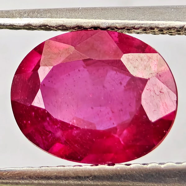 Natural Purplish Red Ruby Gemstones 2.19 Ct. Oval Shape 8.6 x 7 Mm.: Product ID: 805935674 Product Name: Natural Ruby Weight: 2.19 CT. Size: 8.6 x 7 x 3.7 MM. Shape: Oval Color: Purplish Red Clarity:VSI Luster: Good Gems Origin: Madagascar Treatment: Heated (Lead-glass