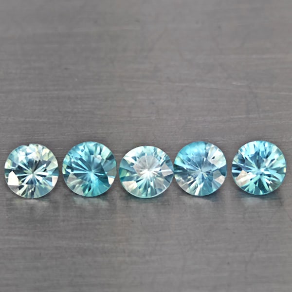 Natural Blue Zircon Gemstones 1.78 Ct. 5 Pcs. Round Diamond Cut 4.2 Mm.: Product ID: 807743275 Product Name: Natural Gemstones Weight: 1.78 CT. Size: 4.2 x 4.2 x 2.8 MM. Shape: Round Diamond Cut Color: Blue Clarity:SI1 Luster: Good Gems Origin: Cambodia Treatment: Heated C