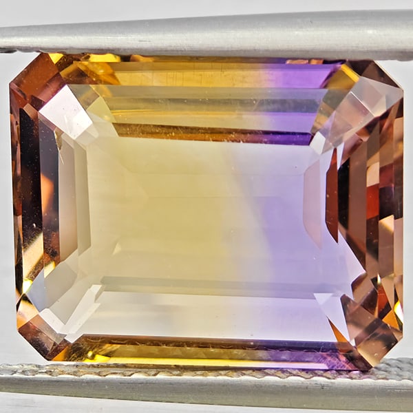 Natural Bi Color Ametrine Gemstones 7.61 Ct. Octagon Shape 13.9 x 11.4 Mm.: Product ID: 800408627 Product Name: Natural Ametrine Weight: 7.61 CT. Size: 13.9 x 11.4 x 6.3 MM. Shape: Octagon Color: Bi Color Clarity:VSI Luster: Good Gems Origin: Bolivia Treatment: Unheated Cryst