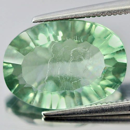 Natural Green Fluorite Gemstones 5.97 Ct. Oval Concave Cut 14 x 10.2 Mm.: Product ID: 802704386 Product Name: Natural Fluorite Weight: 5.97 CT. Size: 14 x 10.2 x 6 MM. Shape: Oval Concave Cut Color: Green Clarity:VSI Luster: Good Gems Origin: Brazil Treatment: Unheated Crys