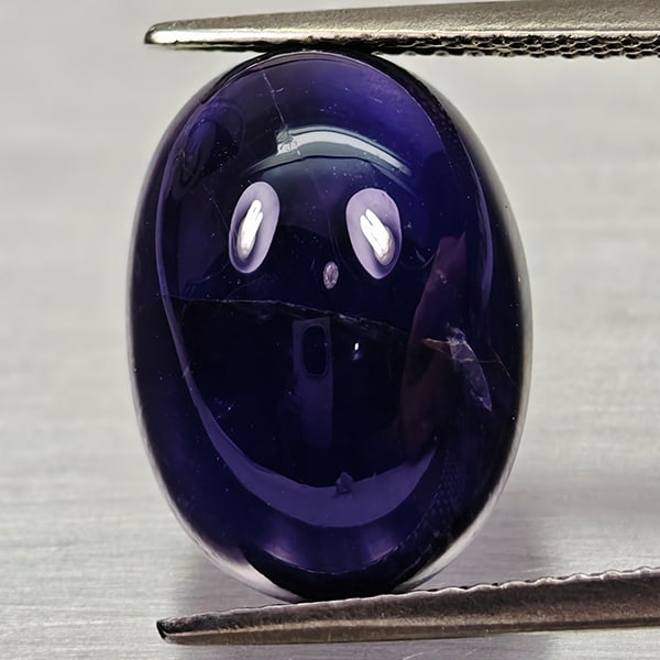 Natural Deep Blue Diffusion Sapphire Gemstones 8.52 Ct. Oval Cabochon Shape 16.9 x 11.2 Mm.: Product ID: 806012001 Product Name: Natural Weight: 8.52 CT. Size: 14.9 x 10.9 x 7.5 MM. Shape: Oval Cabochon Color: Blue Clarity:Opaque Luster: Good Gems Origin: Madagascar Treatment: Diffusion Treat