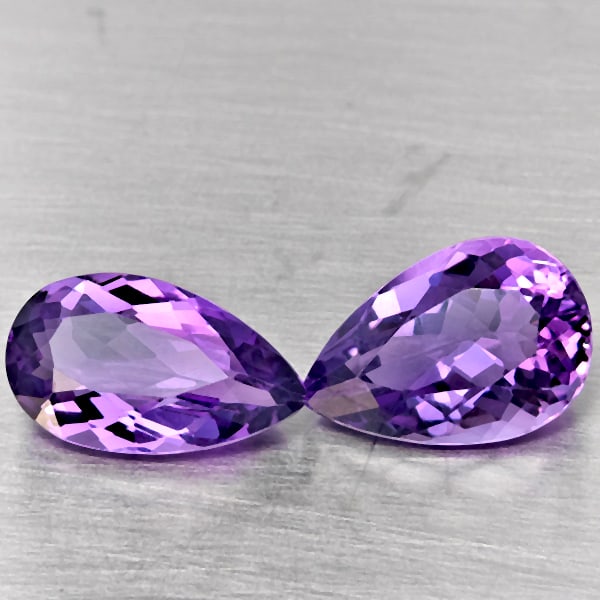 Natural Purple Amethyst Gemstones 7.14 Ct. 2 Pcs. Pear Shape 13.2 x 9.1 Mm.: Product ID: 800325614 Product Name: Natural Amethyst Weight: 7.14 CT. Size: 13.2 x 9.1 x 6.6 MM. Shape: Pear Shape Color: Purple Clarity:VSI Luster: Good Gems Origin: Brazil Treatment: Unheated Crysta