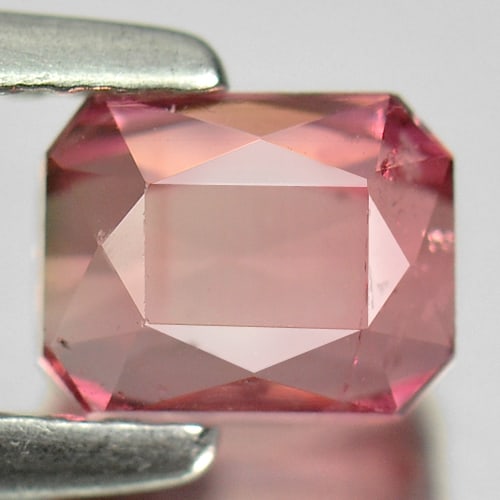Natural Pink Tourmaline Gemstones 1.01 Ct. Octagon Shape 5.6 x 4.5 Mm.: Product ID: 807230027 Product Name: Natural Tourmaline Weight: 1.01 CT. Size: 5.6 x 4.5 x 3.8 MM. Shape: Octagon Color: Pink Clarity:SI Luster: Good Gems Origin: Nigeria Treatment: Unheated Crystal St