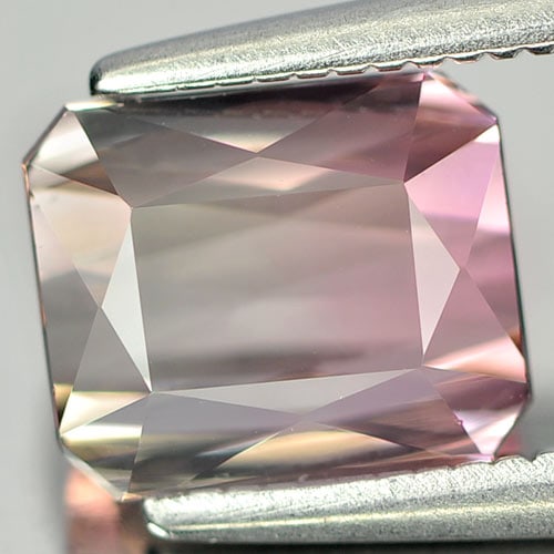 Natural Clean Bi Color Tourmaline 1.89 Ct. Octagon Shape 7.5 x 6.3 Mm.: Product ID: 807226799 Product Name: Natural Tourmaline Weight: 1.89 CT. Size: 7.5 x 6.3 x 4.1 MM. Shape: Octagon Color: Bi Color Clarity:IF Luster: Good Gems Origin: Nigeria Treatment: Unheated Crysta