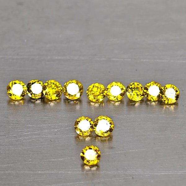 Natural Yellow Loose Diamond 0.17 Ct. 12 Pcs. Round Brilliant Cut 1.5 Mm.: Product ID: 802104593 Product Name: Natural Enhanced Diamond Weight: 0.17 CT. Size: 1.5 x 1.5 x 1 MM. Shape: Round Brilliant Cut Color: Yellow Clarity:VSI Luster: Scintillating Gems Origin: Belgium Tr