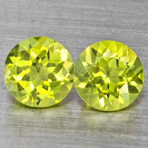 Natural Green Peridot Gemstones 1.11 Ct. 2 Pcs. Round Shape 5.2 Mm.: Product ID: 805317594 Product Name: Natural Peridot Weight: 1.11 CT. Size: 5.2 x 5.2 x 3.4 MM. Shape: Round Color: Green Clarity:VSI Luster: Good Gems Origin: Pakistan Treatment: Unheated Crystal Stru