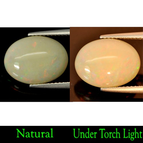 Natural Multi-Color Play Of Colour Opal Gemstones 3.45 Ct. Oval Cabochon Shape 14.2 x 10.8 Mm.: Product ID: 818722324 Product Name: Natural Opal Weight: 3.45 CT. Size: 14.2 x 10.8 x 5 MM. Shape: Oval Cabochon Color: Multi Color Clarity:Semi - Transparent Luster: Strong Iridescent Gems Origin: Et
