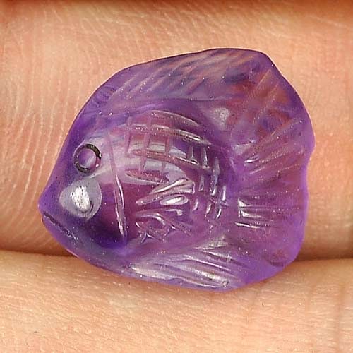 Natural Violet Amethyst Gemstones 7.46 Ct. Fish Carving Shape 14.6 x 12 Mm.: Product ID: 810303464 Product Name: Natural Amethyst Weight: 7.46 CT. Size: 14.6 x 12 x 7.3 MM. Shape: Fish Carving Color: Violet Clarity:Semi - Transparent Luster: Good Gems Origin: Brazil Treatment: