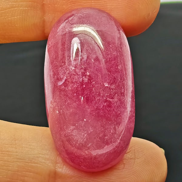 Natural Pink Red Ruby Gemstones 52.65 Ct. Oval Cabochon Shape 30 x 11 Mm.: Product ID: 805935284 Product Name: Natural Ruby Weight: 52.65 CT. Size: 30 x 11 x 10 MM. Shape: Oval Cabochon Color: Purplish Red Clarity:Opaque Luster: Good Gems Origin: Madagascar Treatment: Heated