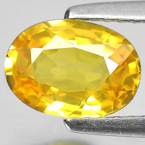Natural Yellow Sapphire Gemstones 1.40 Ct. Oval Shape 8 x 5.8 Mm.: Product ID: 806160912 Product Name: Natural Yellow Sapphire Weight: 1.40 CT. Size: 8 x 5.8 x 3.3 MM. Shape: Oval Color: Yellow Clarity:VSI Luster: Very Good Gems Origin: Thailand Treatment: Heated Cry