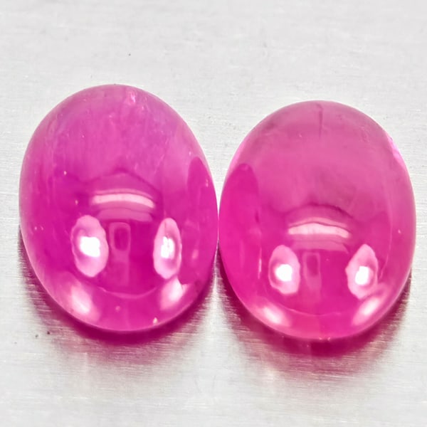 Natural Pink Red Jonson Ruby Gemstones 1.61 Ct. 2 Pcs Oval Cabochon Shape 6.2 x 4.2 Mm.: Product ID: 805935750 Product Name: Natural Ruby Weight: 1.61 CT. Size: 6.2 x 4.2 x 3.1 MM. Shape: Oval Cabochon Color: Pink Red Clarity:Semi - Transparent Luster: Good Gems Origin: Mozambique Treatme