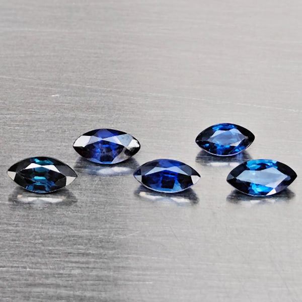 Natural Blue Sapphire Gemstones 0.75 Ct. 5 Pcs. Marquise Shape 4.7 x 2.2 Mm.: Product ID: 806012392 Product Name: Natural Blue Sapphire Weight: 0.75 CT. Size: 4.7 x 2.2 x 2 MM. Shape: Marquise Shape Color: Blue Clarity:SI1 Luster: Good Gems Origin: Madagascar Treatment: Heated 
