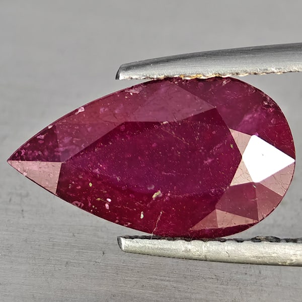 Natural Purplish Red Ruby Gemstones 3.94 Ct. Pear Shape 14.5 x 8.5 Mm.: Product ID: 805935900 Product Name: Natural Ruby Weight: 3.94 CT. Size: 14.5 x 8.5 x 4.3 MM. Shape: Pear Shape Color: Purplish Red Clarity:SI1 Luster: Good Gems Origin: Madagascar Treatment: Heated (L