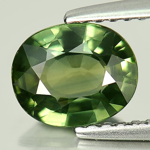 Natural Green Sapphire Gemstones 1.32 Ct. Clean Oval Shape 7.6 x 6.3 Mm.: Product ID: 806156617 Product Name: Natural Green Sapphire Weight: 1.32 CT. Size: 7.6 x 6.3 x 3.2 MM. Shape: Oval Color: Green Clarity:IF Luster: Very Good Gems Origin: Thailand Treatment: Heated Crys